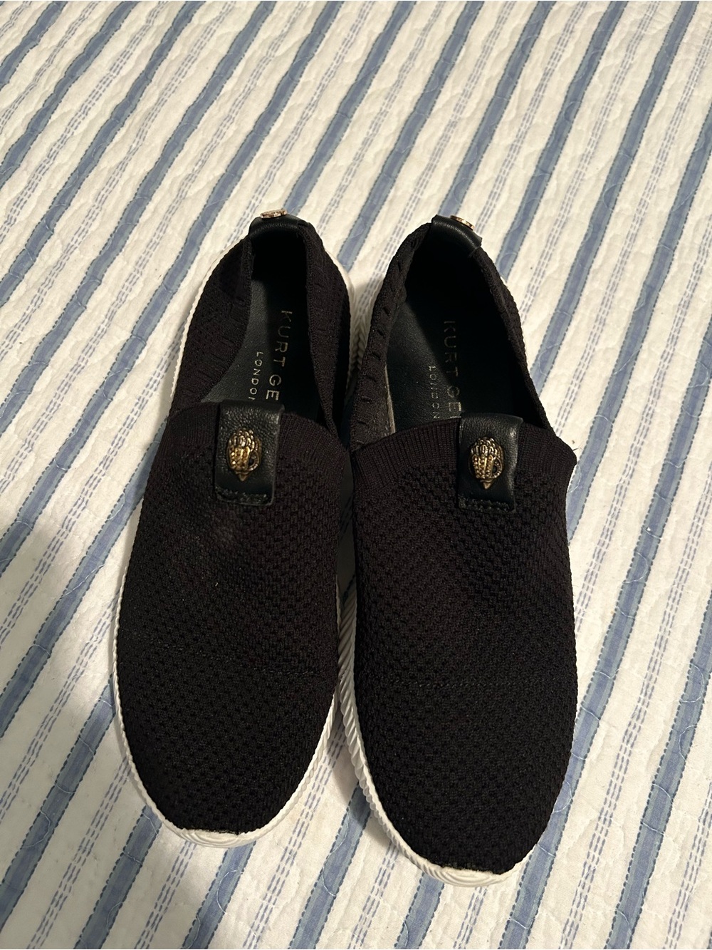 Kurt Geiger Black Knit Slip-On Sneakers with Gold Emblem